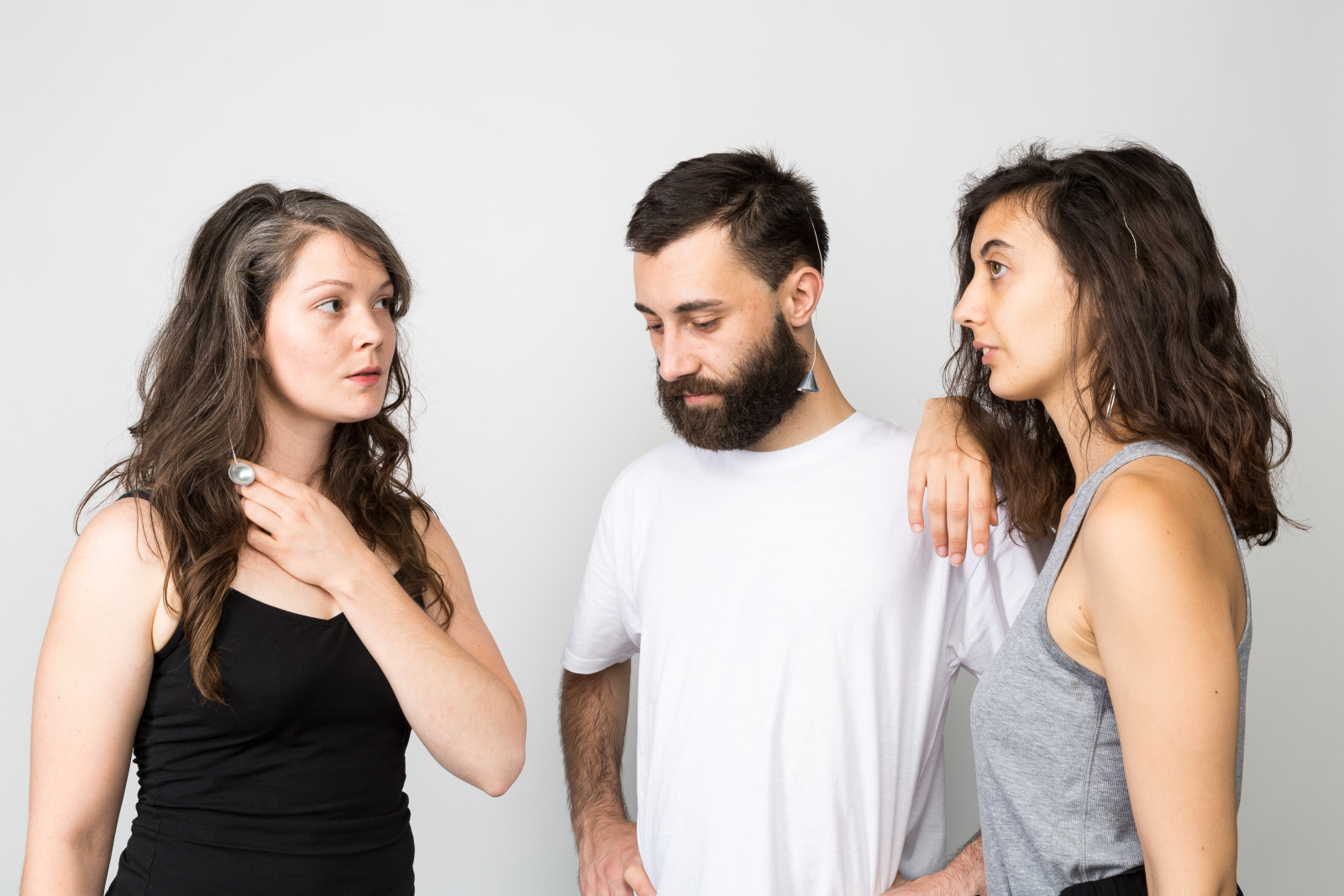 Group photo of all three antennas by two women and a man