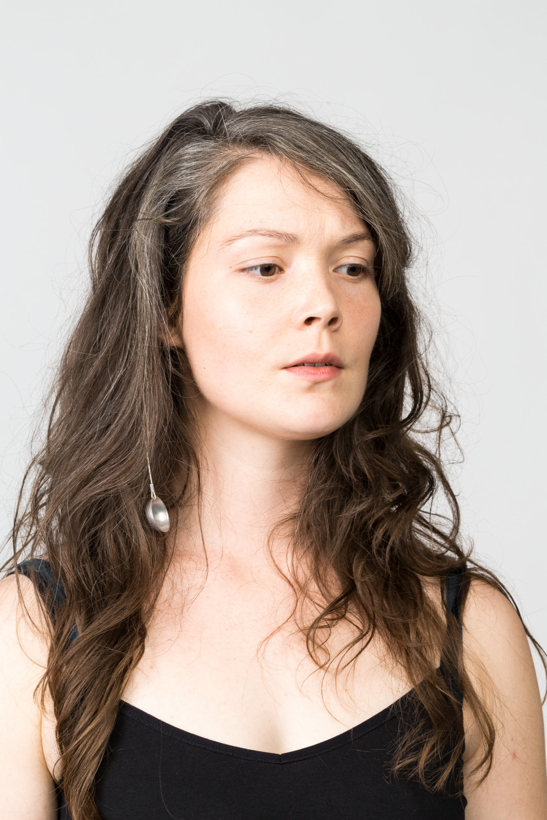 Portrait photo of the parabolic antenna on a woman